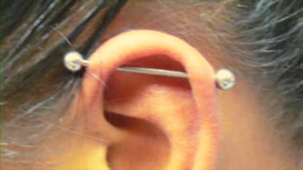 P. What Is an Industrial Piercing aka Scaffold Piercing? Promo Image