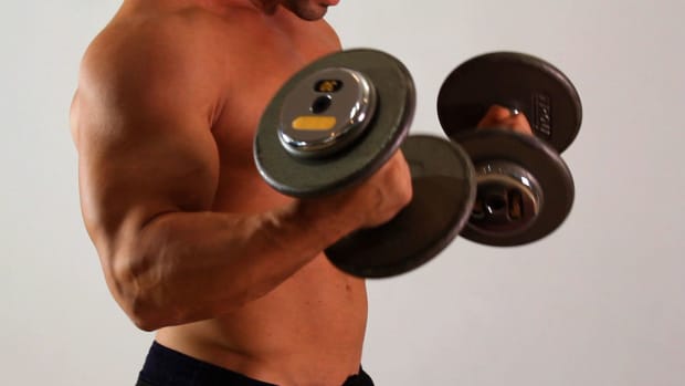 L. How to Do a Dumbbell Biceps Curl for an Arm Workout Promo Image