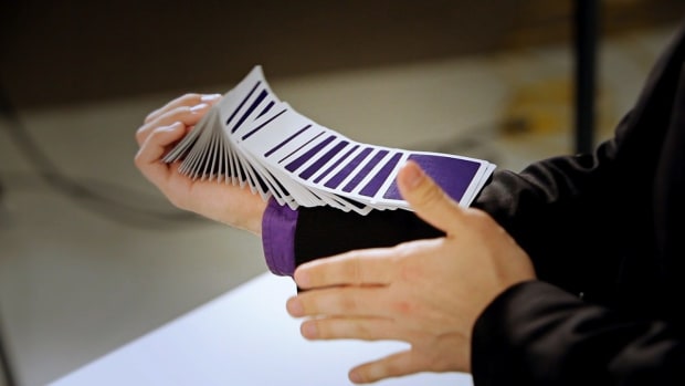 ZA. How to Do an Arm Spread Card Flourish Promo Image