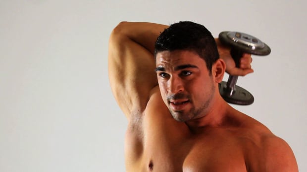 R. How to Do a Dumbbell Tricep Extension for an Arm Workout Promo Image