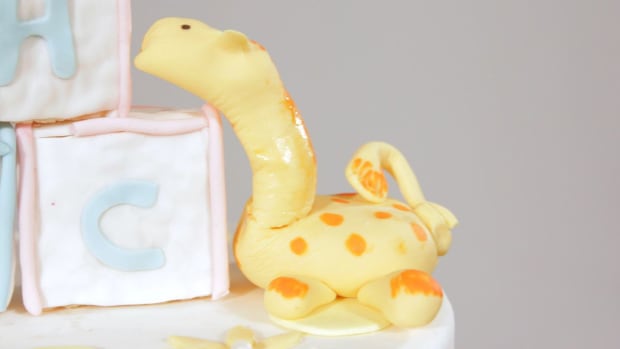 C. How to Make a Fondant Giraffe for a Jungle Theme Cake Promo Image