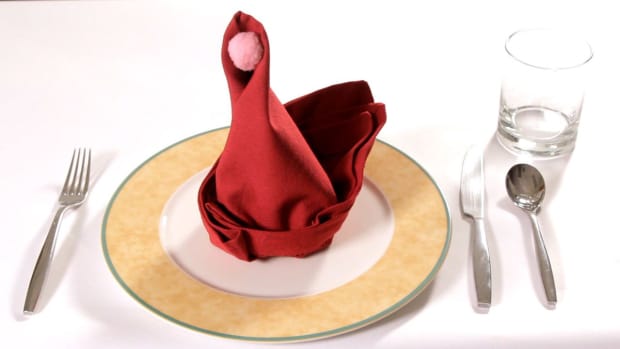 J. How to Fold a Napkin into a Clown Hat Promo Image