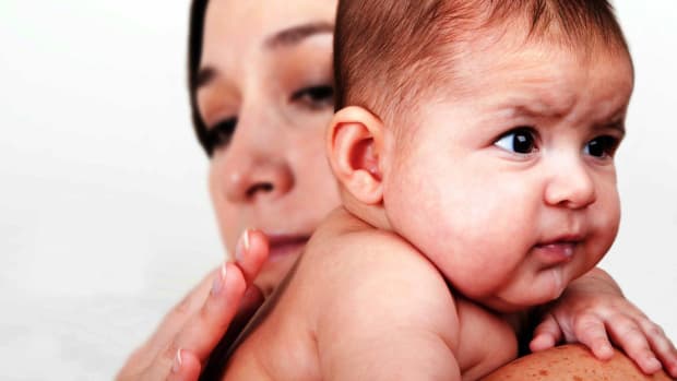 ZL. How to Handle Infant Spit-Up & Vomit Promo Image