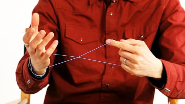 S. How to Do the Vanishing Rubber Band Office Magic Trick Promo Image
