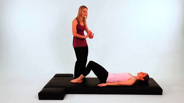 F. How to Do a Pelvic Tilt in Pilates Promo Image
