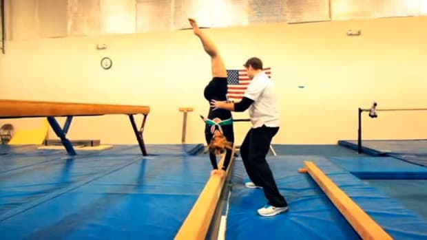 P. How to Walk on a Balance Beam in Gymnastics Promo Image