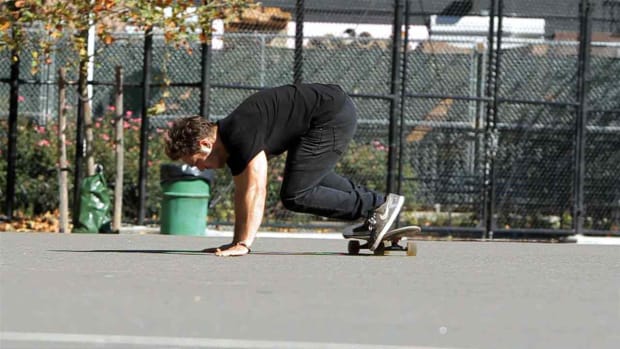 J. How to Do a Hand-Assisted Slide on a Skateboard Promo Image