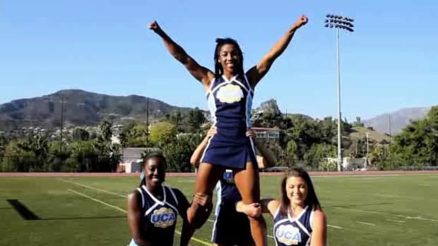 T. How to Do a Double-Based Thigh Stand in Cheerleading Promo Image