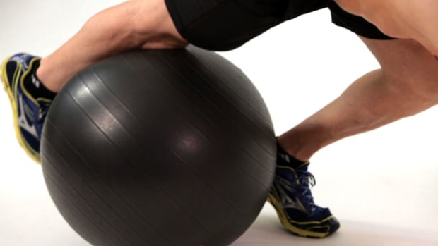 ZA. How to Do Knee Tucks on Exercise Ball Promo Image