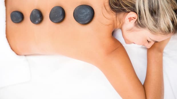 M. What Is Hot Stone Massage? Promo Image