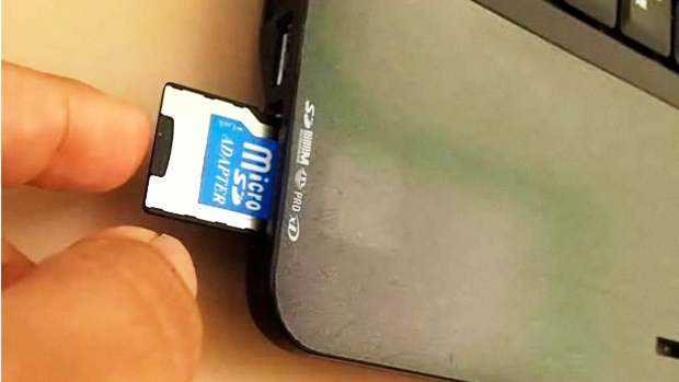 How to Use an SD Card Reader - Howcast