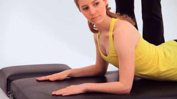 ZJ. How to Do a Neck Roll in Pilates Promo Image