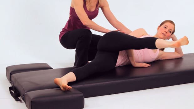 R. How to Do a Front & Back Side Kick in Pilates Promo Image