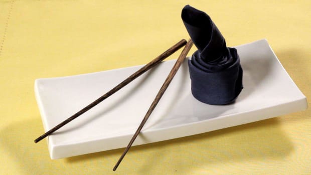 C. How to Fold a Napkin into a Sushi Roll Promo Image