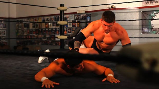 G. How to Do a Reverse Hammerlock Wrestling Move Promo Image