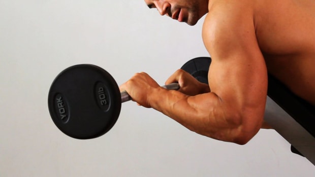 ZB. How to Do an Angled Prone Reverse Curl for an Arm Workout Promo Image