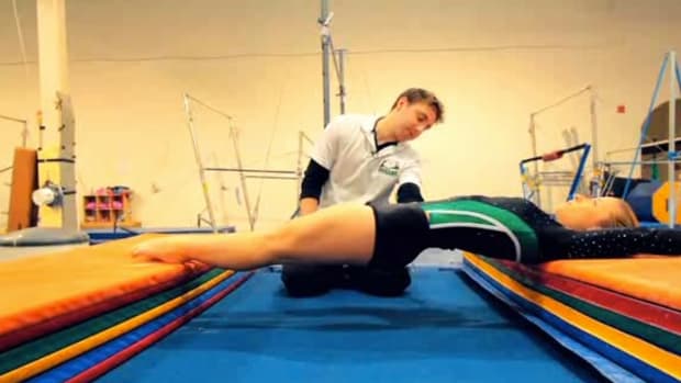 E. How to Do a Handstand in Gymnastics Promo Image