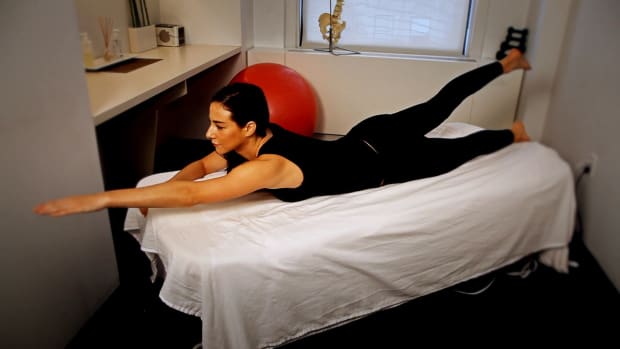 C. How to Do the Swimmer Exercise for Back Pain Relief Promo Image