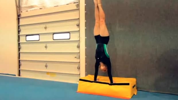 R. How to Do a Round Off Handspring Drill in Gymnastics Promo Image