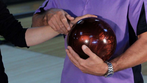 C. How to Be Fitted for a Bowling Ball Promo Image