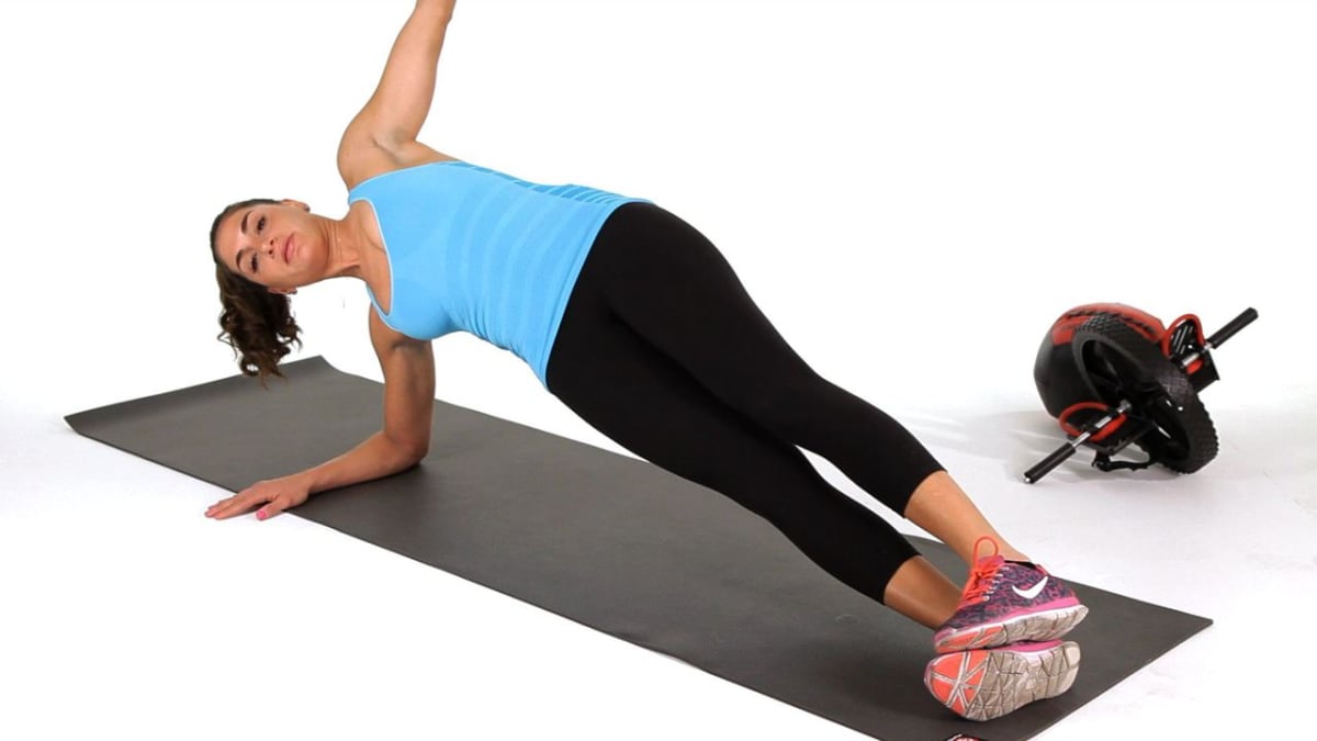 How to Do a Side Plank with Hip Lifts Howcast