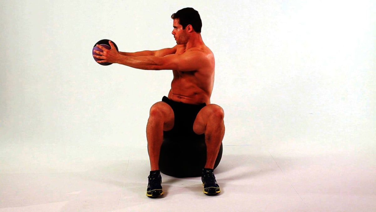 How to Do a Seated Twist on Exercise Ball Howcast