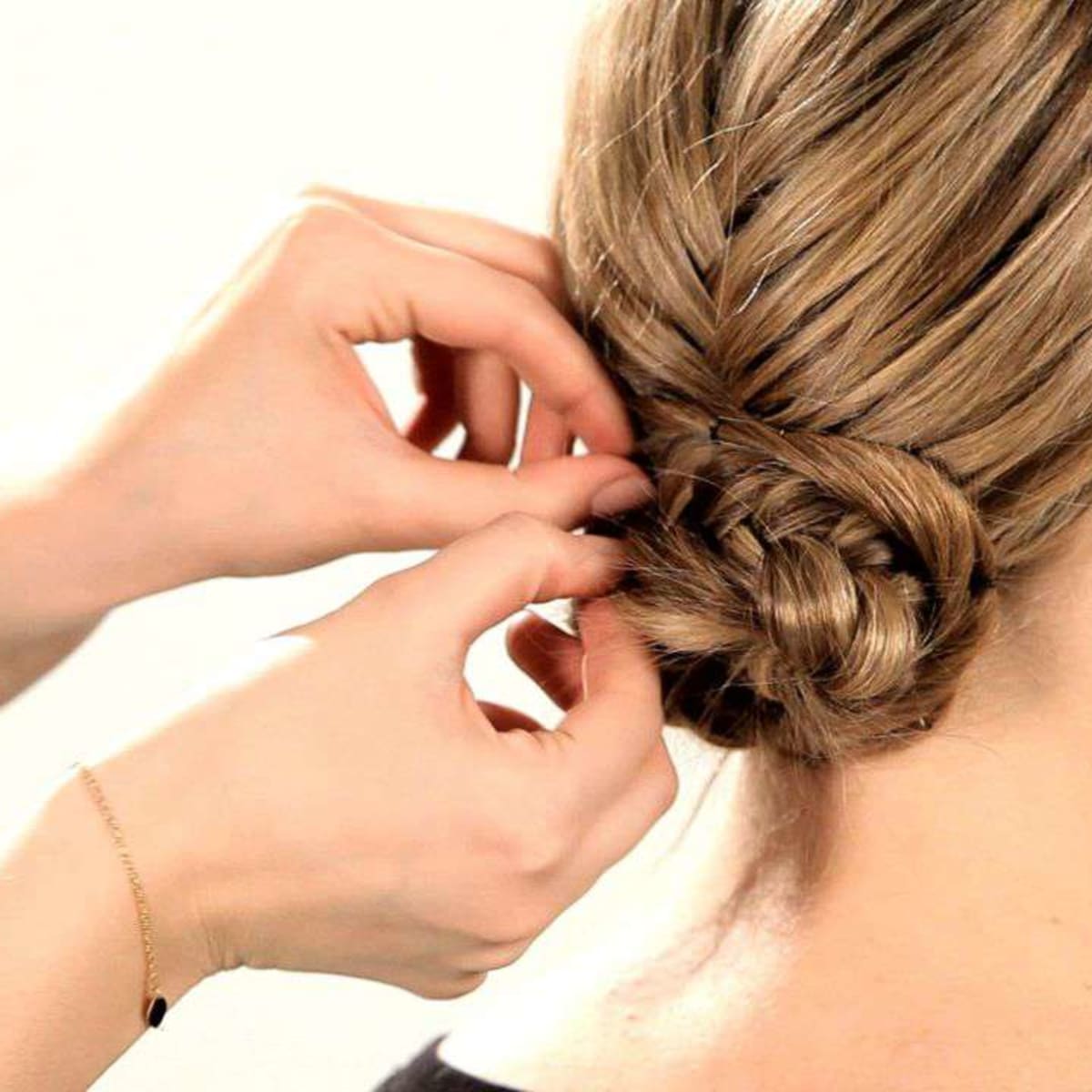 How to Do a Fishtail Updo - Howcast How to Do a Fishtail Updo - Howcast