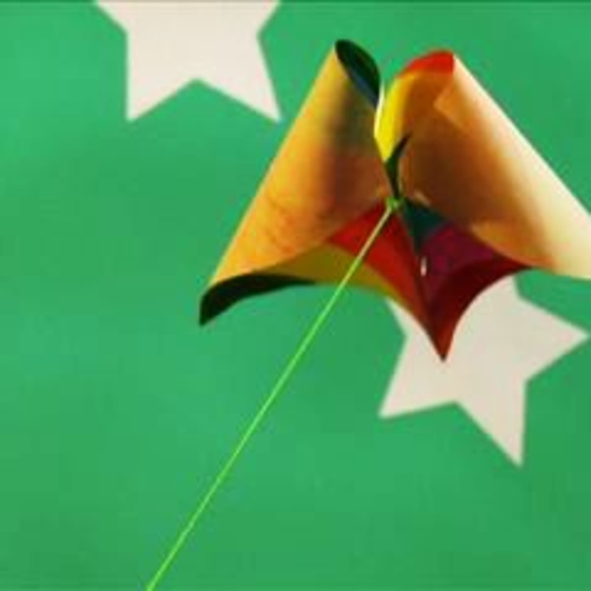 How to Make a Simple Paper Kite - Howcast