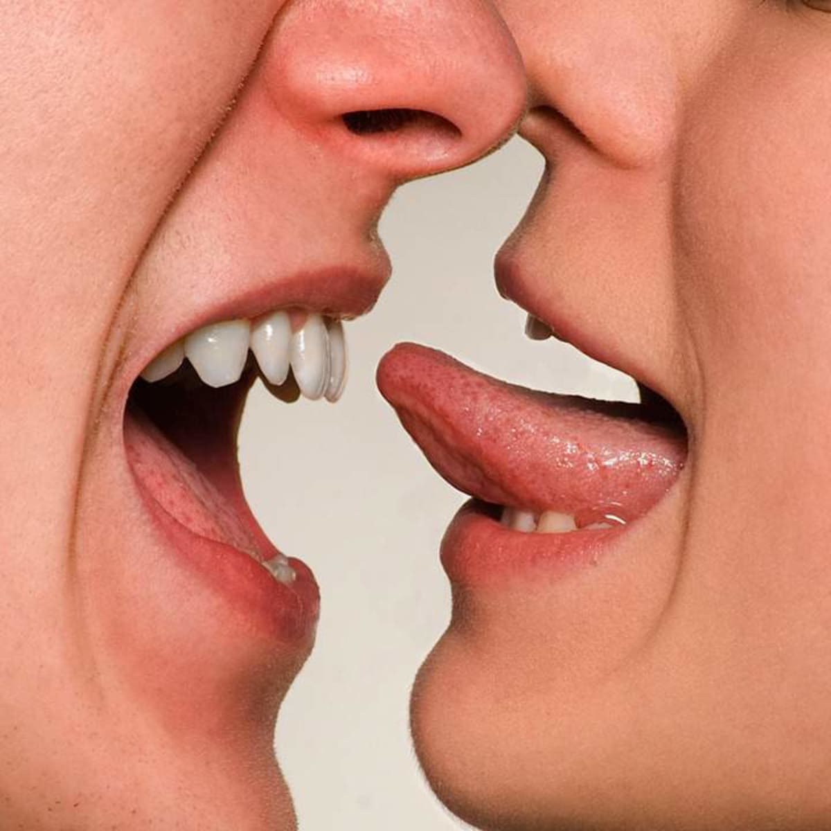 People tongue kissing