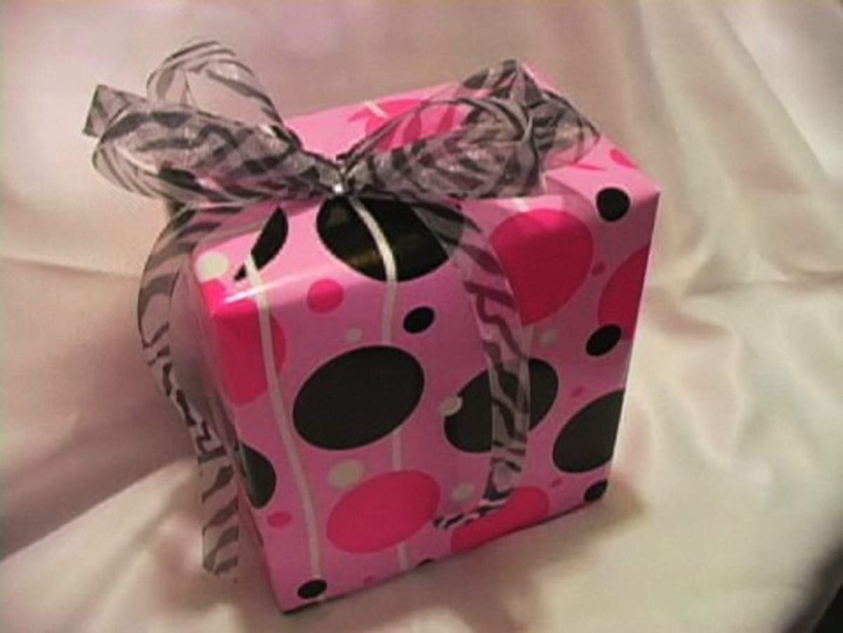 How to Make a Bow Out of Ribbon - Howcast