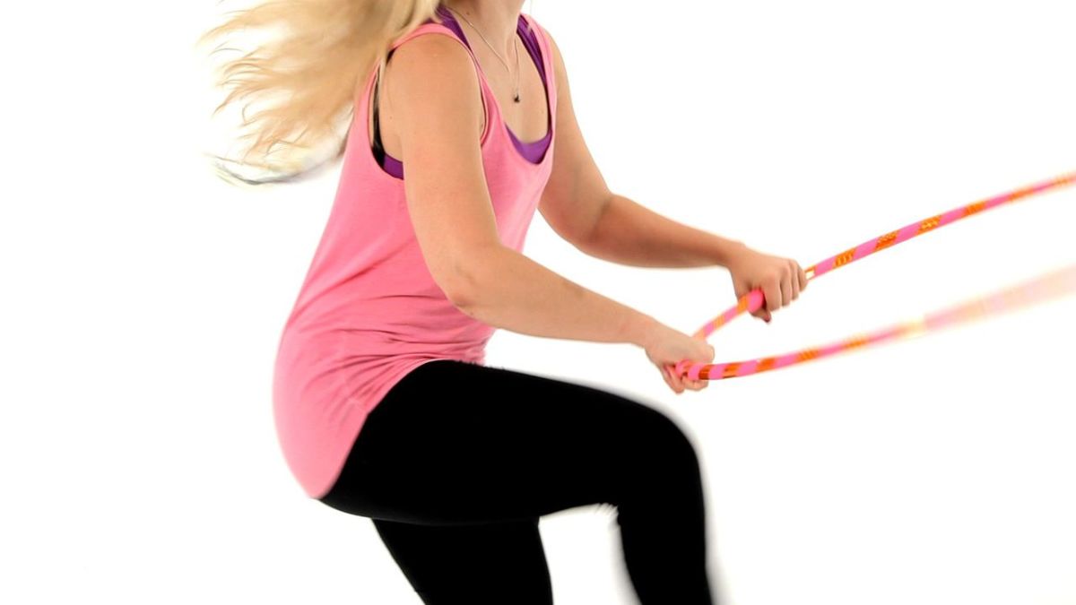 How to Do a Hula Hoop Horizontal Jump Through Howcast