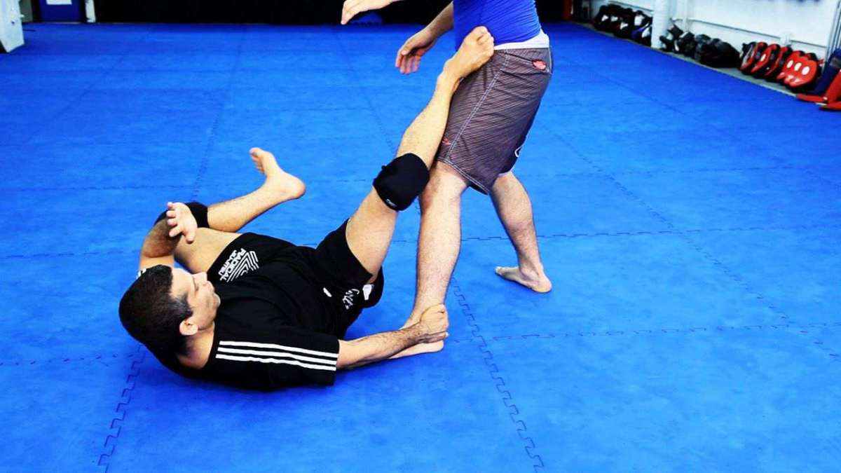 How to Do De La Riva Guard Attacks in MMA Fighting Howcast