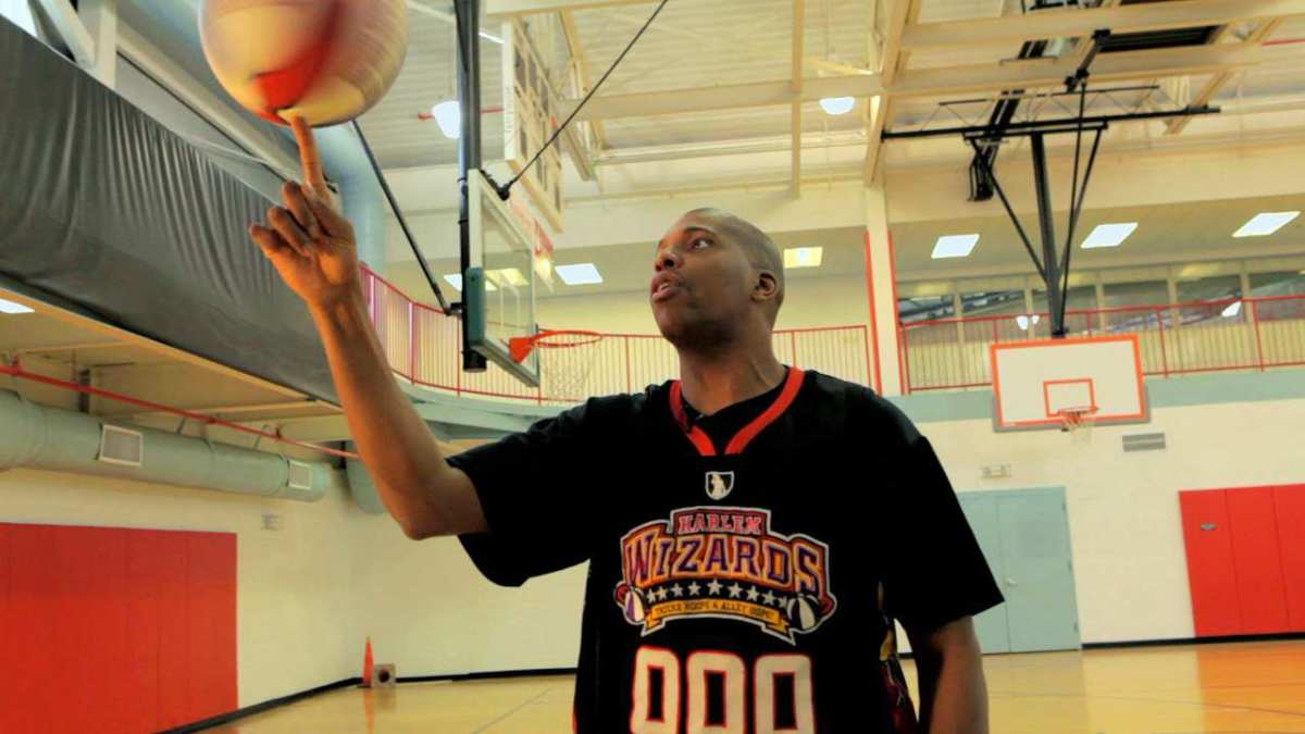 How to Spin a Basketball on Your Finger Howcast