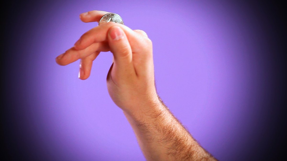 How to Do the Coin Rolling Magic Trick Howcast