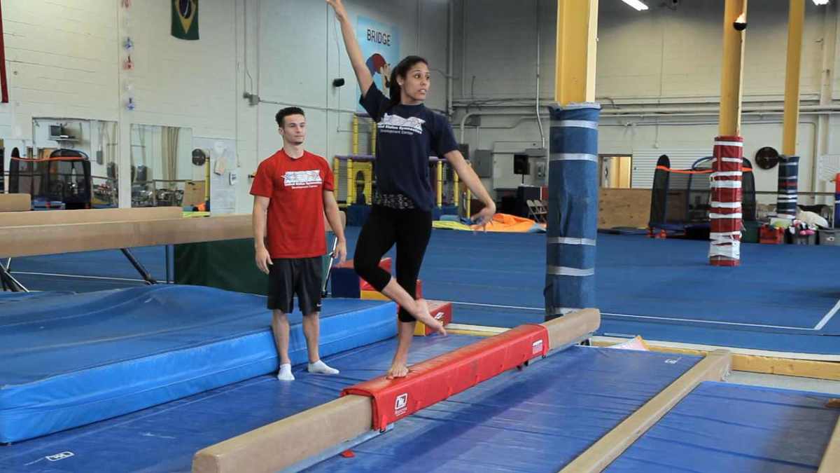 How to Do a Balance Beam Routine Howcast