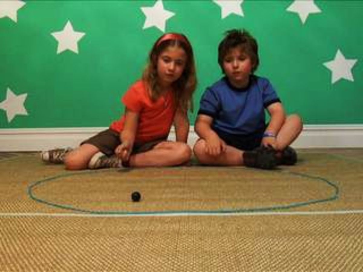 How to Play Marbles Howcast How to Play Marbles Howcast