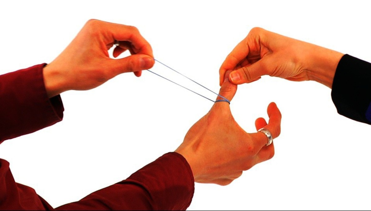 How to Do the Rubber Band through the Thumb Trick Howcast