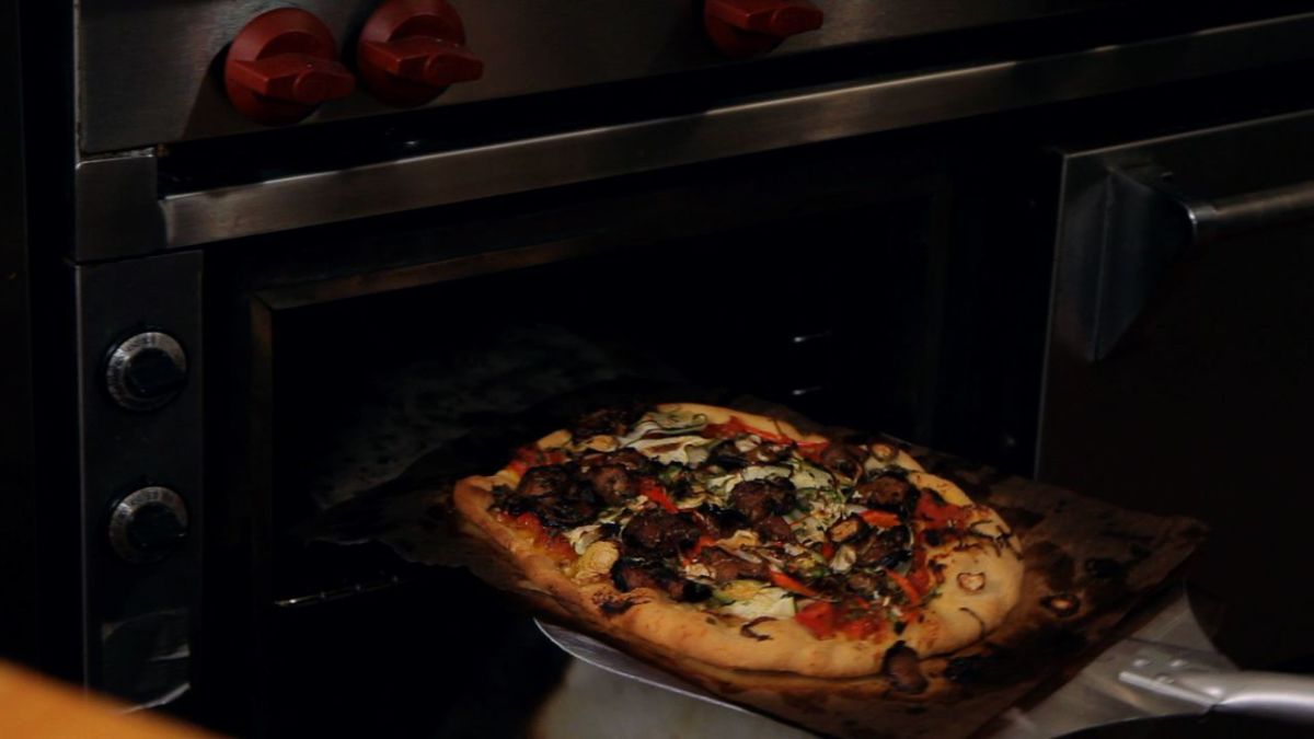 How to Make Pizza on a Pizza Stone Howcast
