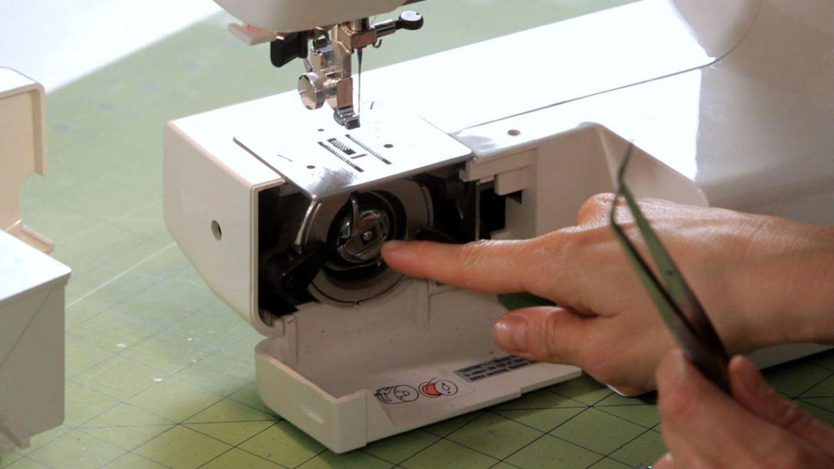 How to Fix a Thread Jam in a Sewing Machine Howcast