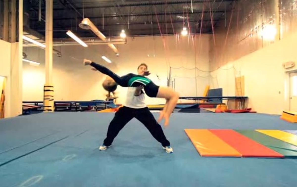 How to do a backflip drill in gymnastics howcast