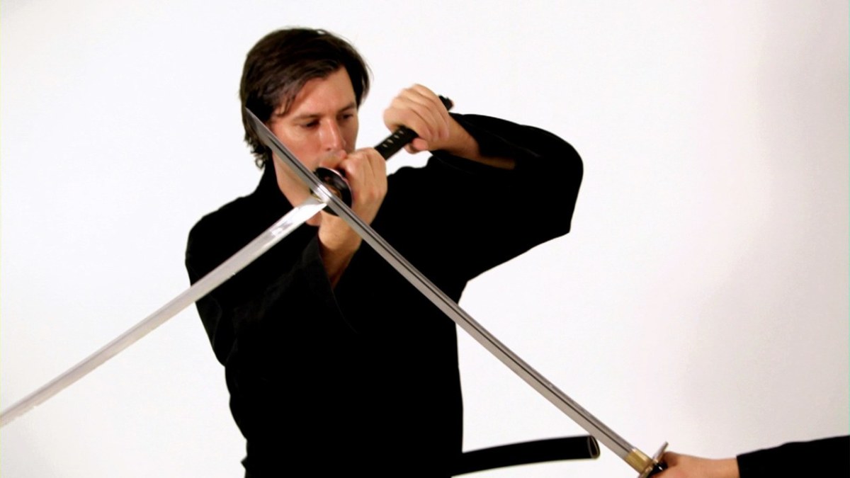 How to Use a Katana Defensive Move in a Sword Fight Howcast