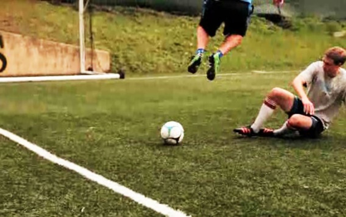 How to Slide Tackle in Soccer Howcast