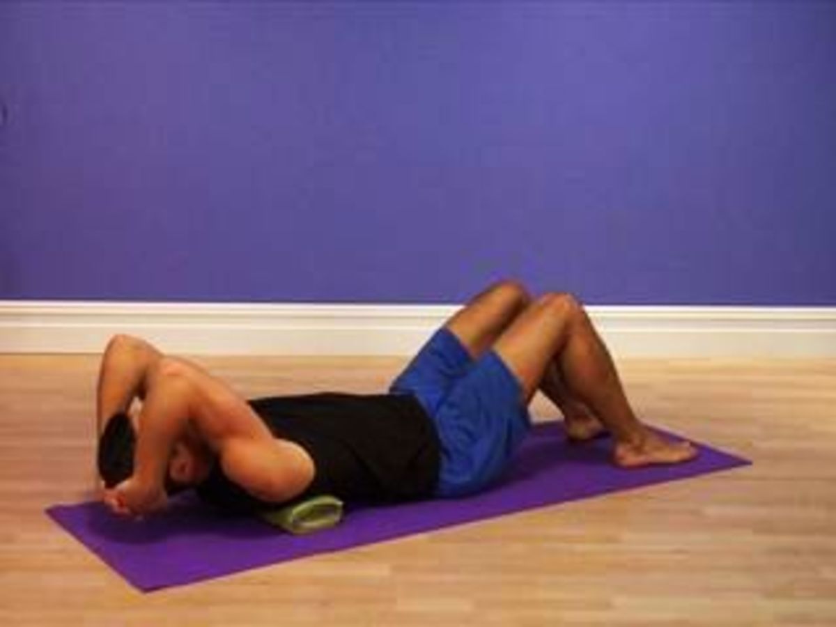 How to Stretch for Back Pain 3: Upper Back Spine Roller - Howcast
