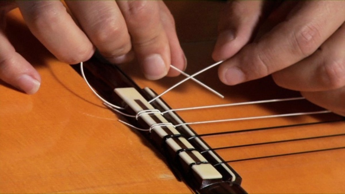 How to Restring a Nylon String Acoustic Guitar Howcast