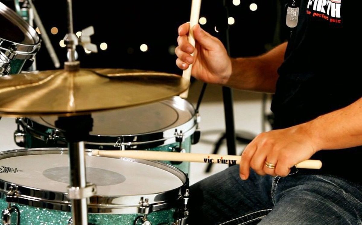 How to Play the Triple Paradiddle on the Drums Howcast