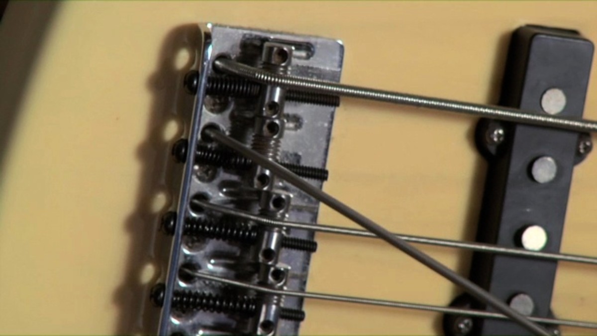 How to Restring a Bass Guitar Howcast