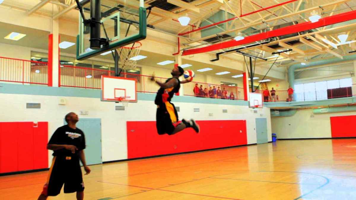 How to Do an OfftheBackboard Dunk in Basketball Howcast