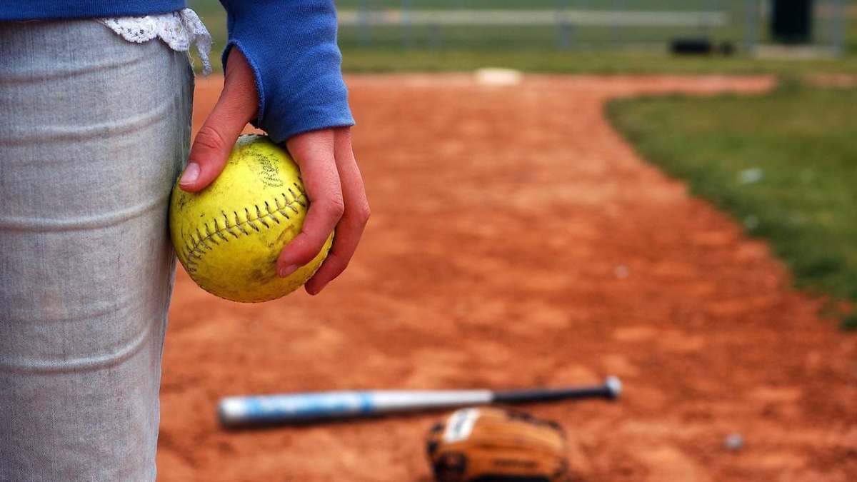 How to Throw a Pitch in FastPitch Softball Howcast