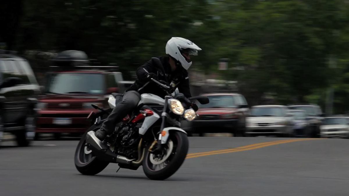 How to Lean a Motorcycle - Howcast