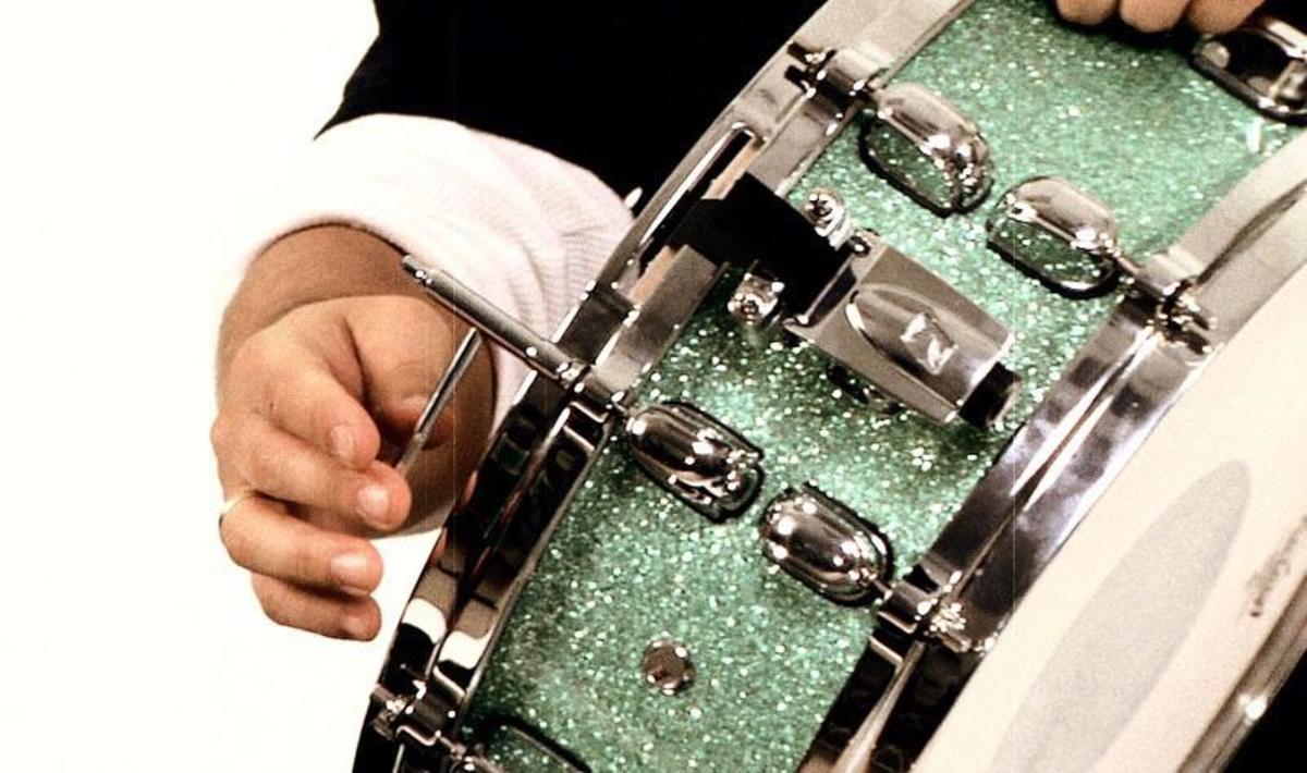 How to Tune a Snare Drum Howcast